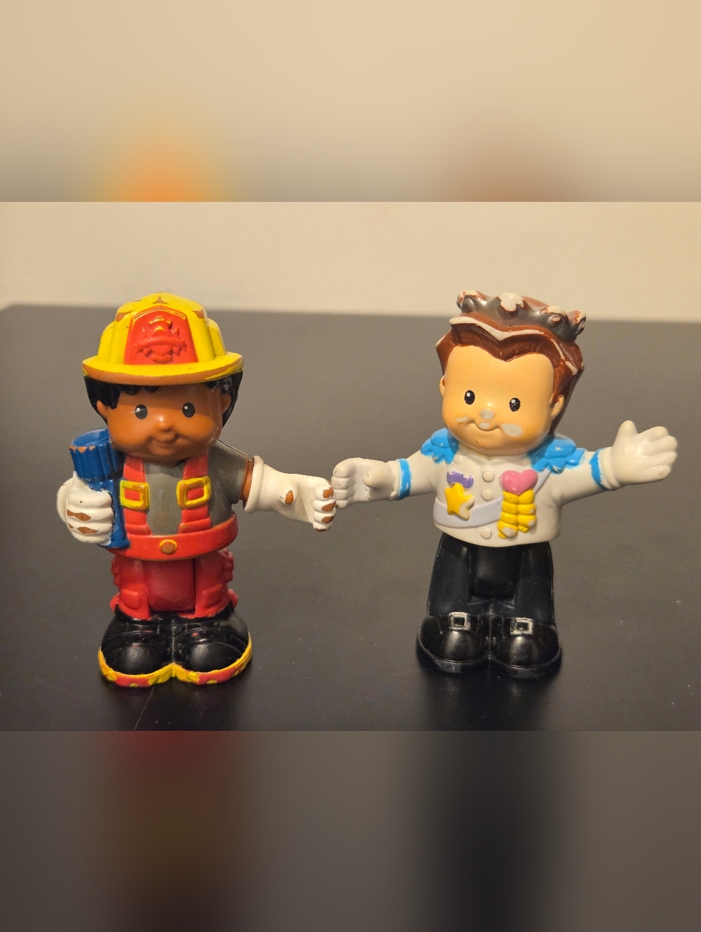 Fisher-Price Little People Bendable Figures Firefighter Michael and King Ethan
